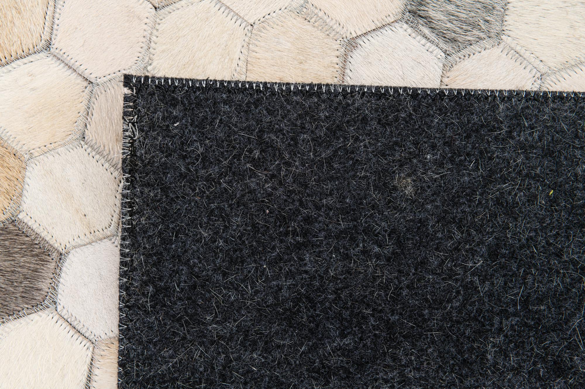 4' 9 x 7' 11 Cowhide Stocks Rug