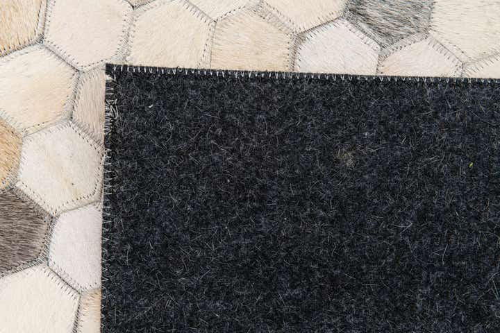 4' 9 x 7' 11 Cowhide Stocks Rug