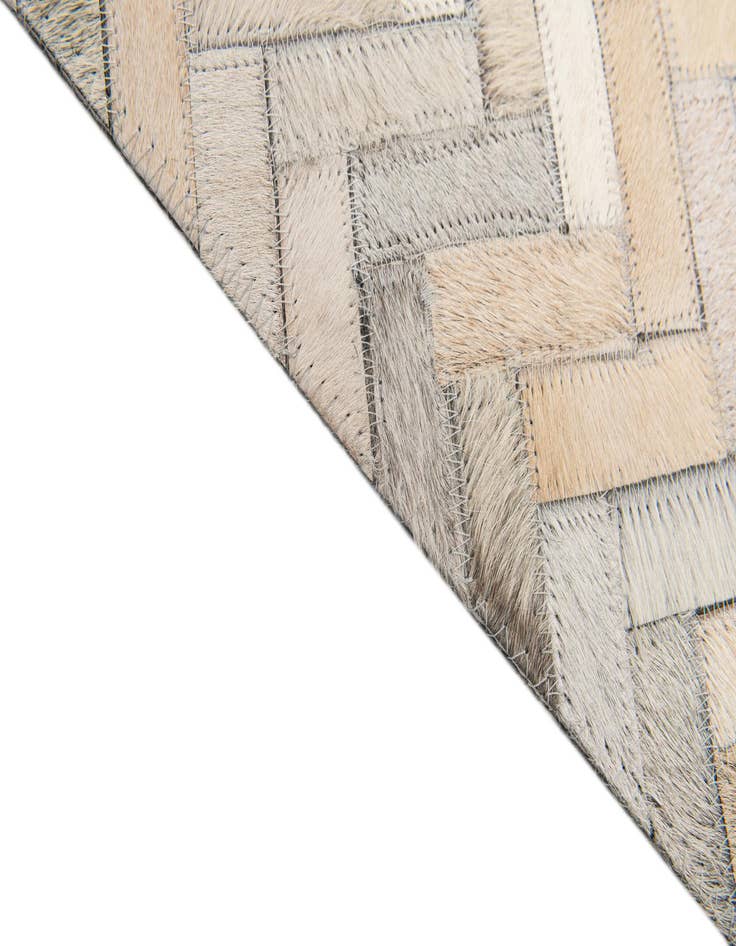 Detail image of 4' 10 x 7' 10 Cowhide Stocks Rug