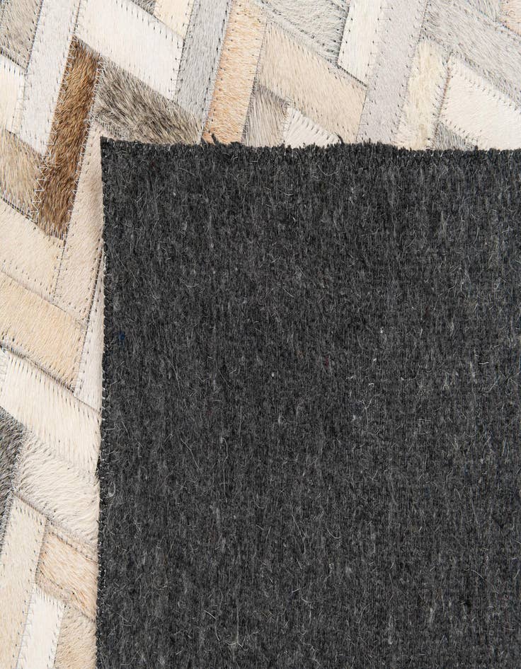 Detail image of 4' 10 x 7' 10 Cowhide Stocks Rug