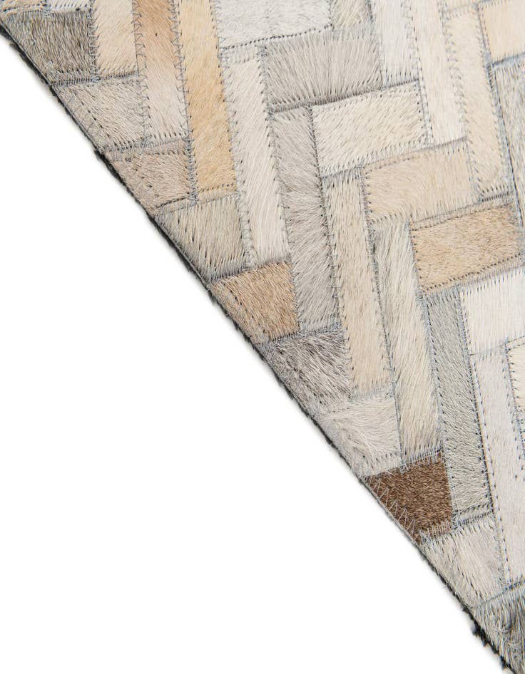 Detail image of 4' 10 x 7' 9 Cowhide Stocks Rug