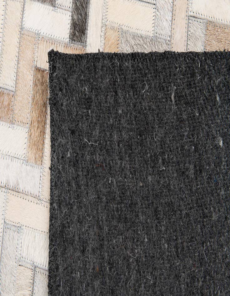 Detail image of 4' 10 x 7' 9 Cowhide Stocks Rug