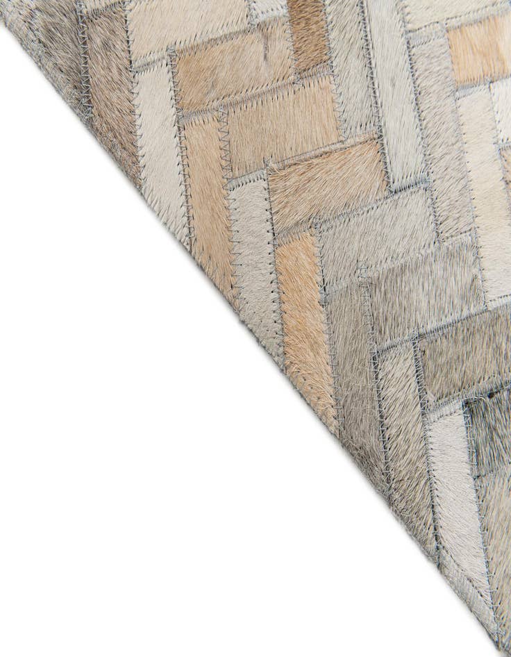 Detail image of 4' 10 x 7' 11 Cowhide Stocks Rug