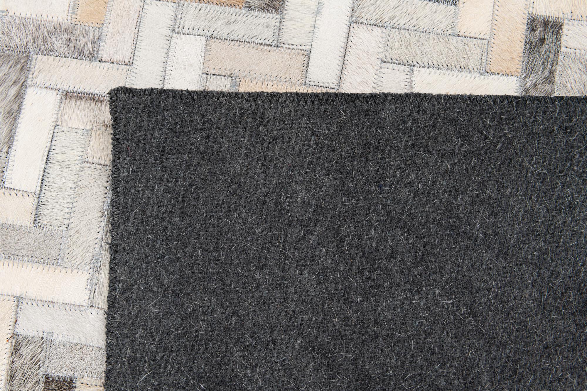 4' 10 x 7' 11 Cowhide Stocks Rug