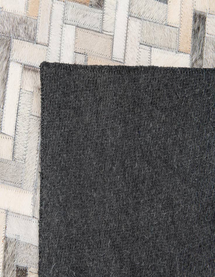 Detail image of 4' 10 x 7' 11 Cowhide Stocks Rug
