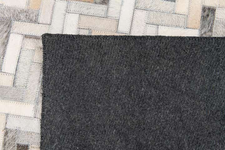 4' 10 x 7' 11 Cowhide Stocks Rug