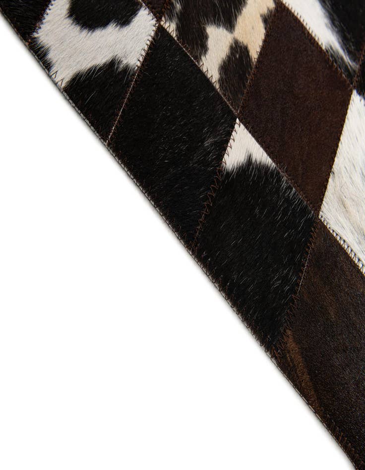 Detail image of 5' x 7' 11 Cowhide Stocks Rug