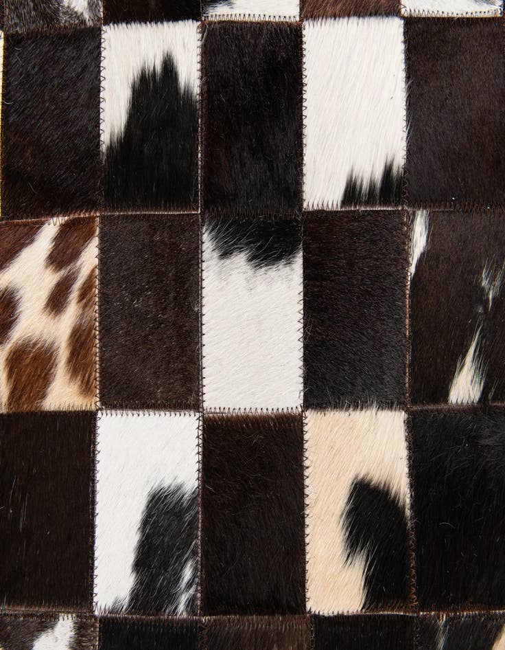 Detail image of 5' x 7' 11 Cowhide Stocks Rug
