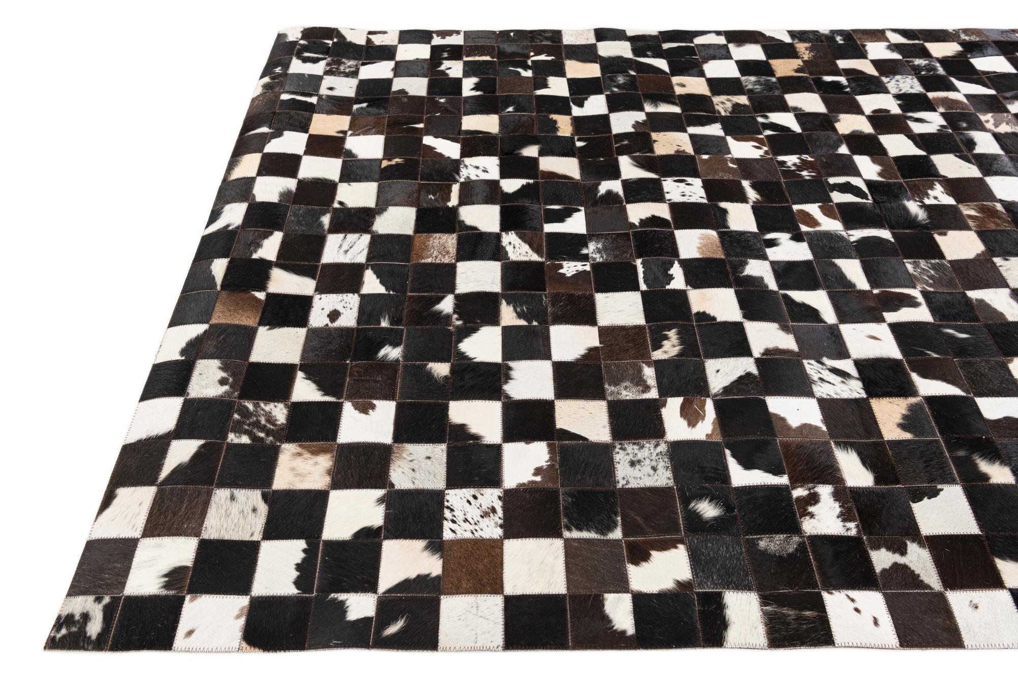 5' x 7' 11 Cowhide Stocks Rug