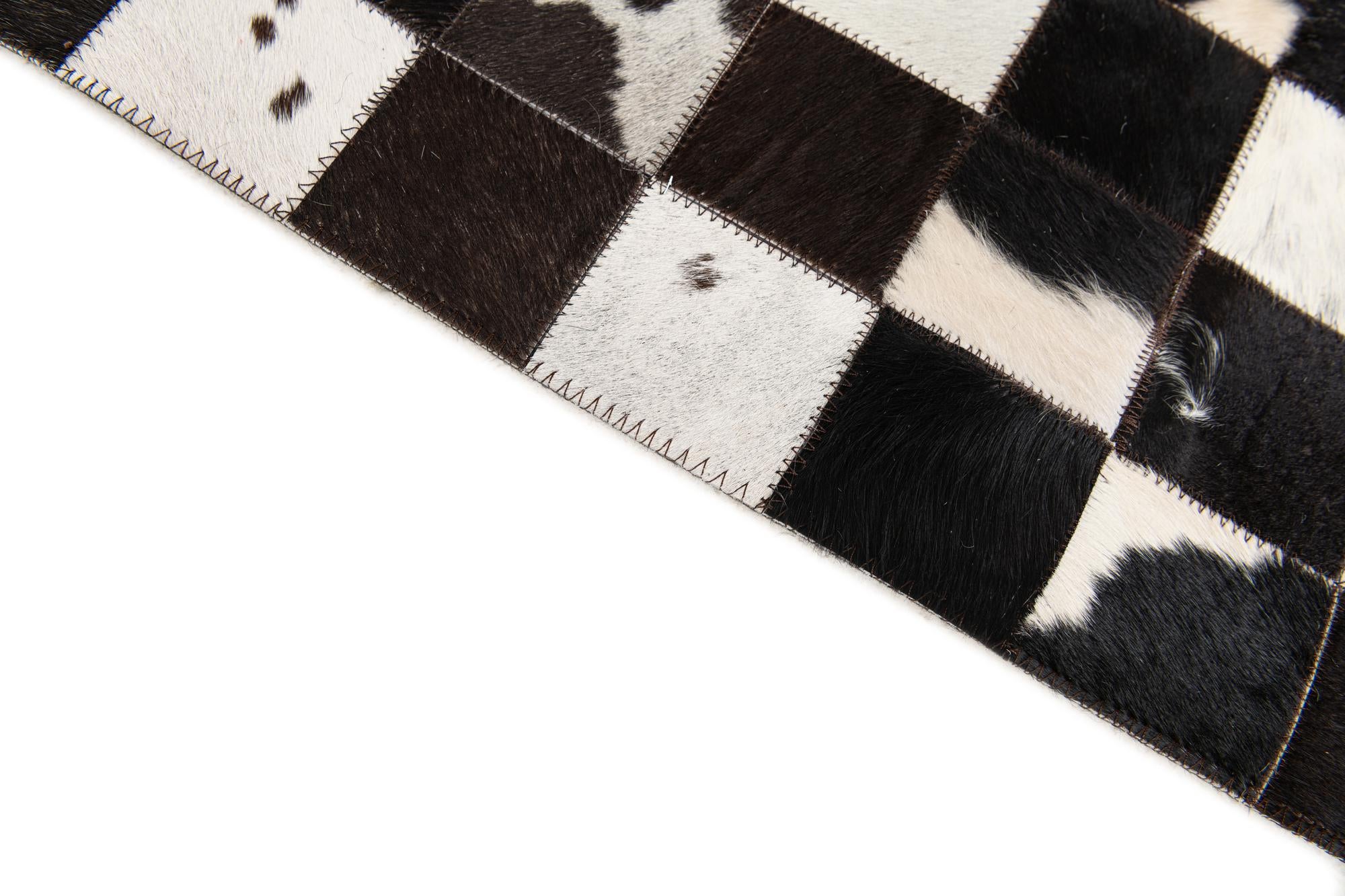 5' x 7' 11 Cowhide Stocks Rug