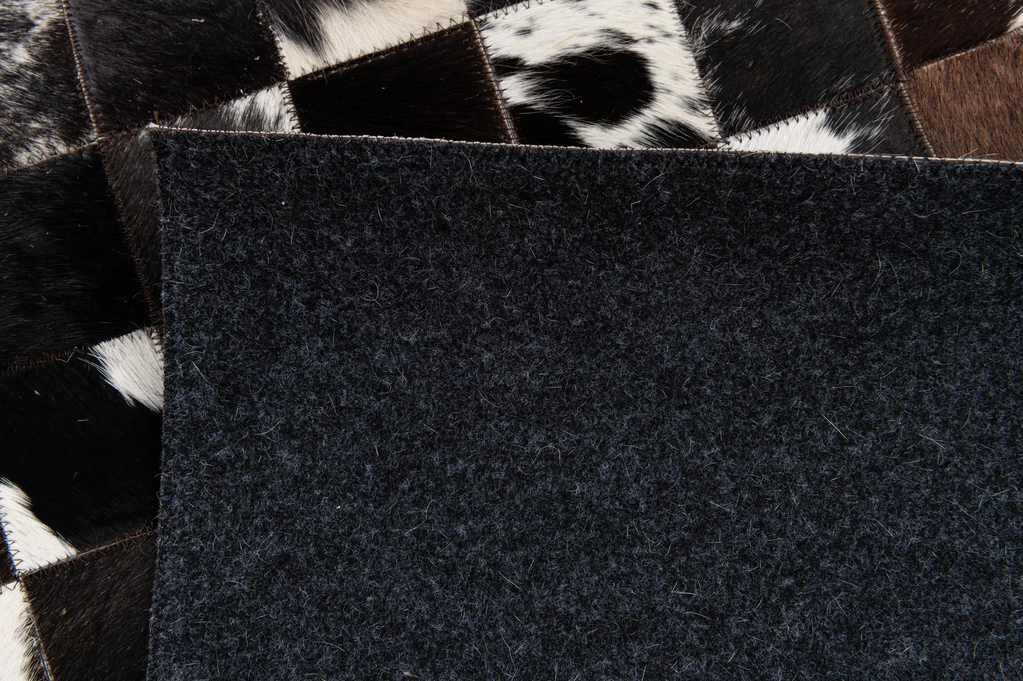 5' x 7' 11 Cowhide Stocks Rug