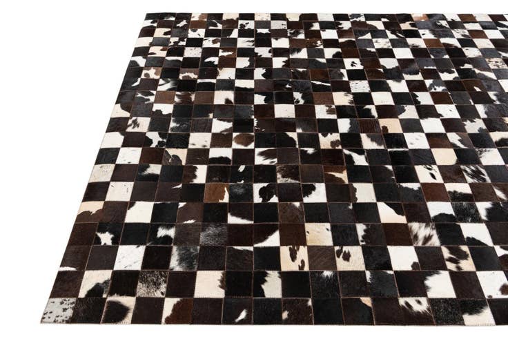 Detail image of 5' x 7' 11 Cowhide Stocks Rug