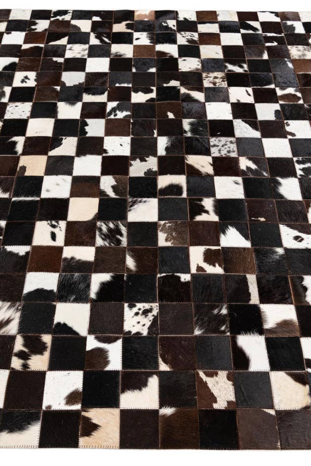 Detail image of 5' x 7' 11 Cowhide Stocks Rug