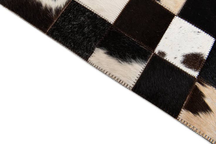 Detail image of 5' x 7' 11 Cowhide Stocks Rug