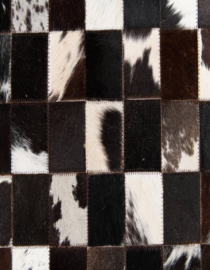 Detail image of 5' x 7' 11 Cowhide Stocks Rug