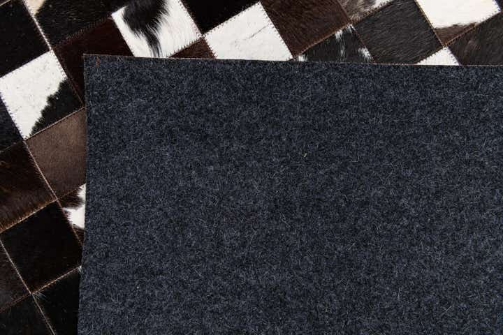 5' x 7' 11 Cowhide Stocks Rug