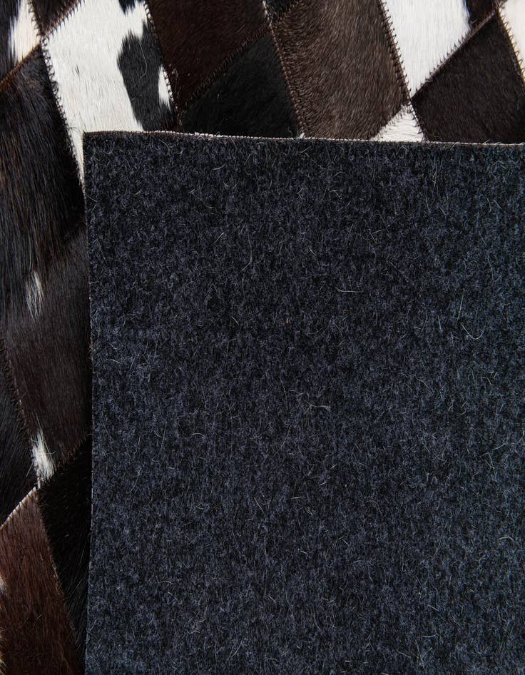 Detail image of 5' 1 x 8' Cowhide Stocks Rug