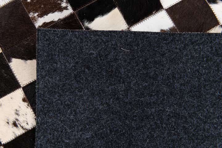 5' x 8' Cowhide Stocks Rug