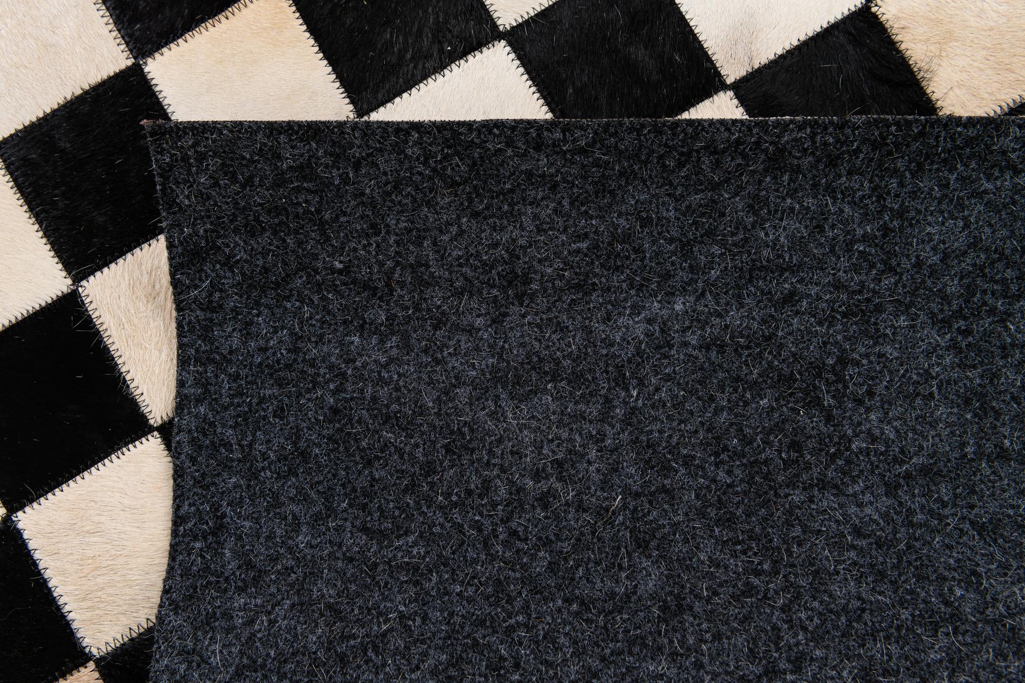 5' 8 x 7' 10 Cowhide Stocks Rug
