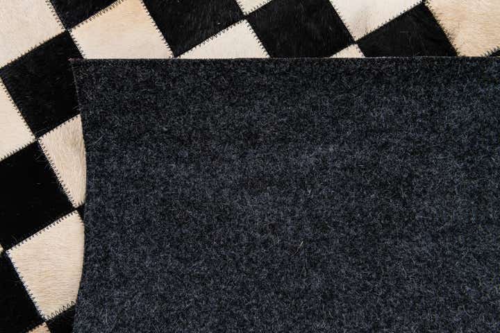 5' 8 x 7' 10 Cowhide Stocks Rug