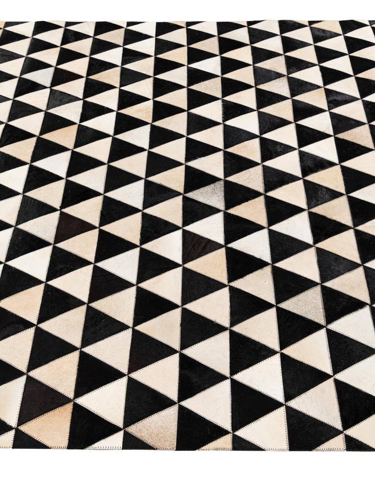 Detail image of 5' 1 x 8' 1 Cowhide Stocks Rug