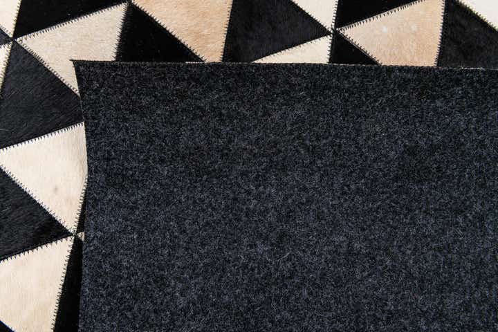 5' 1 x 8' 1 Cowhide Stocks Rug
