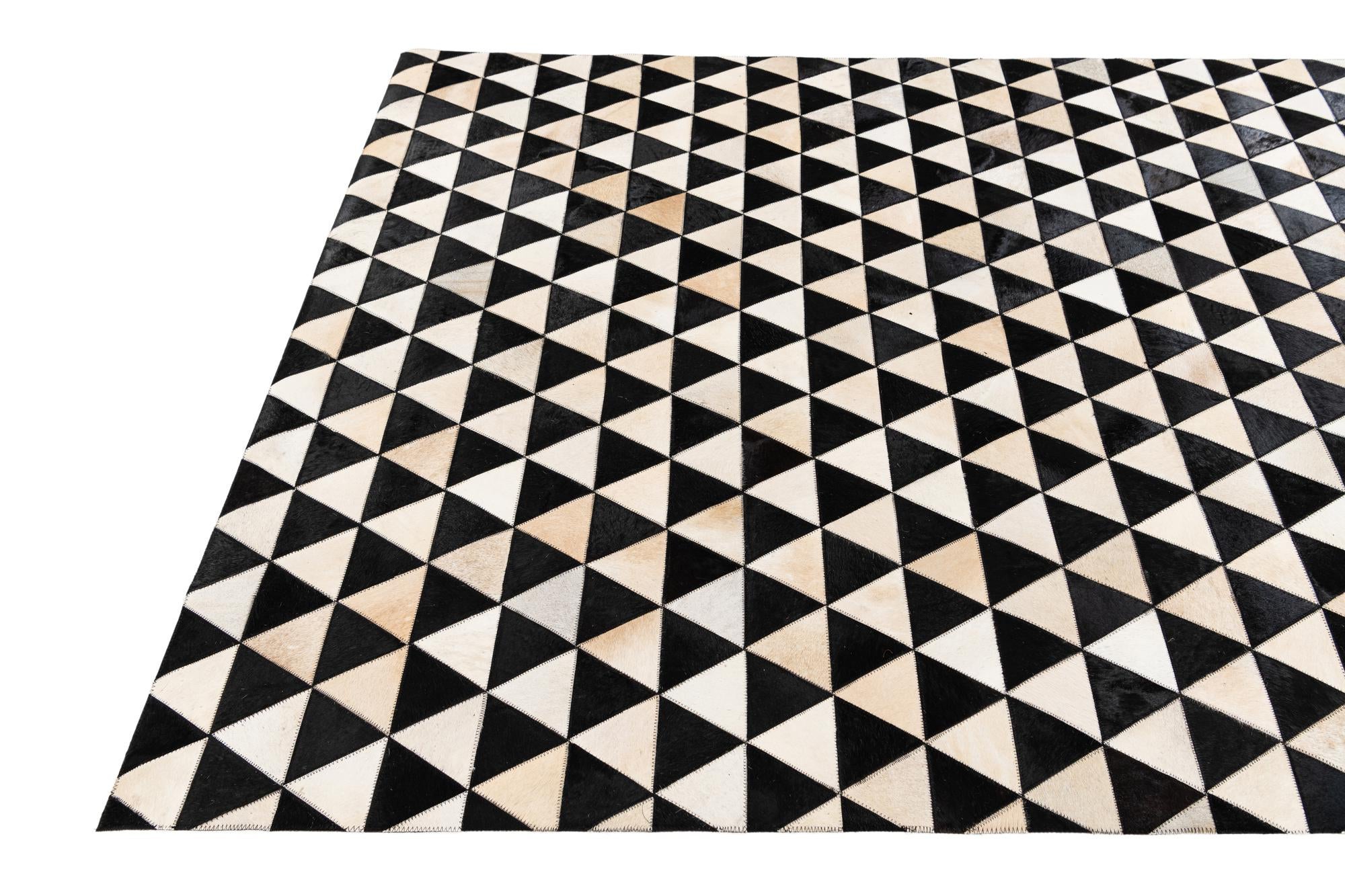 5' 1 x 8' 2 Cowhide Stocks Rug