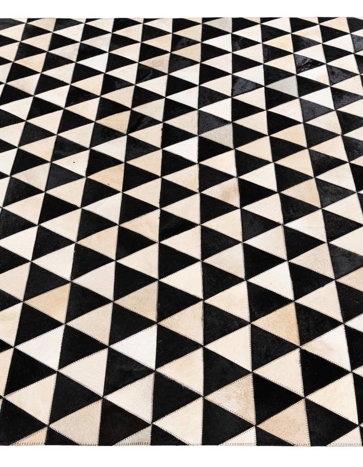 Detail image of 5' 1 x 8' 2 Cowhide Stocks Rug