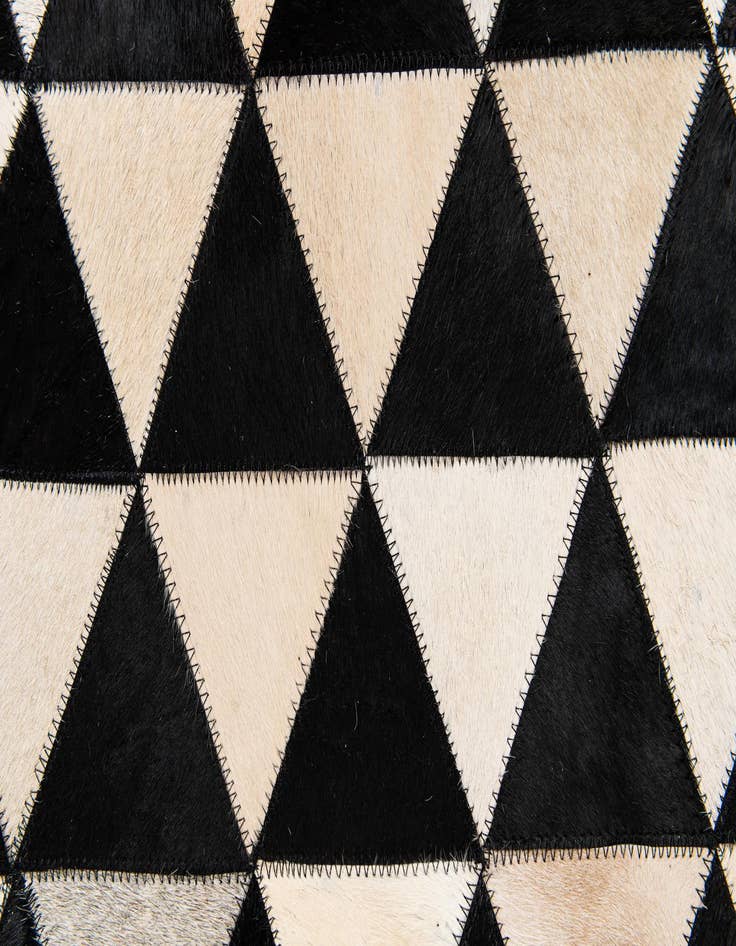 Detail image of 5' 1 x 8' 2 Cowhide Stocks Rug