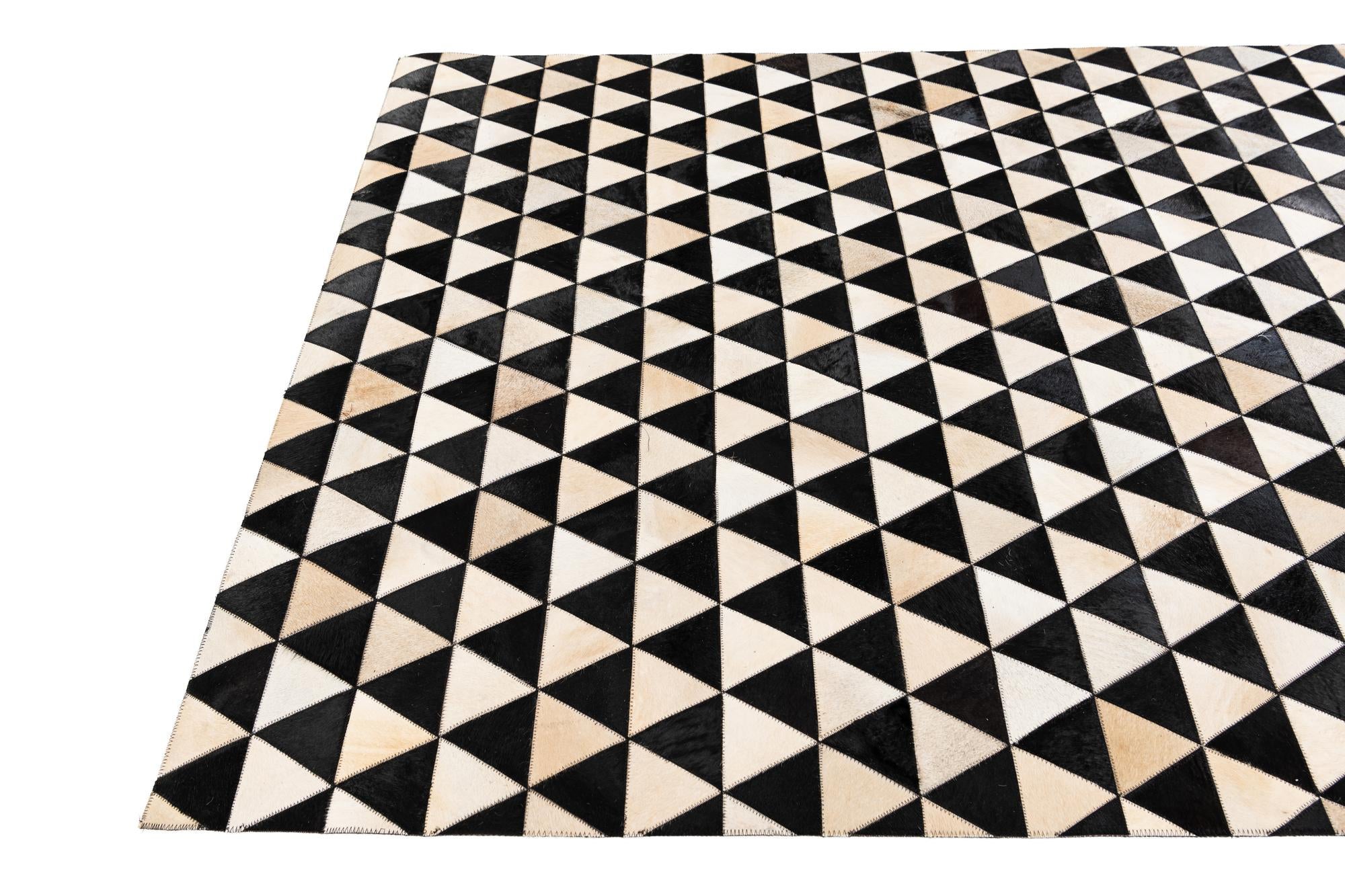 5' 1 x 8' 2 Cowhide Stocks Rug