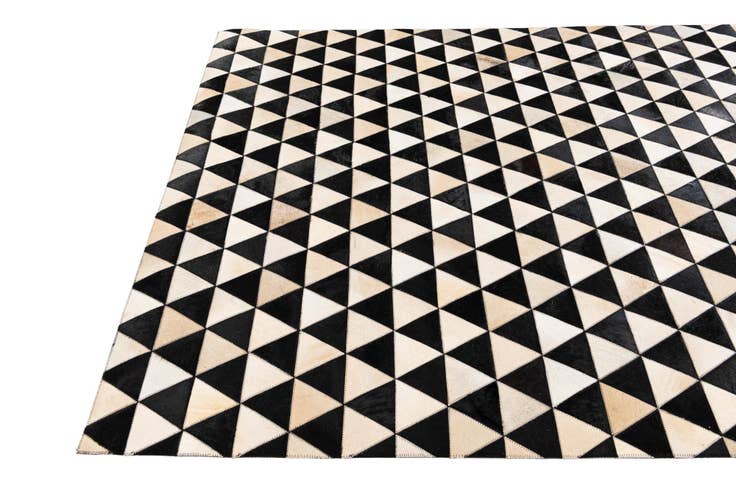 Detail image of 5' 1 x 8' 2 Cowhide Stocks Rug