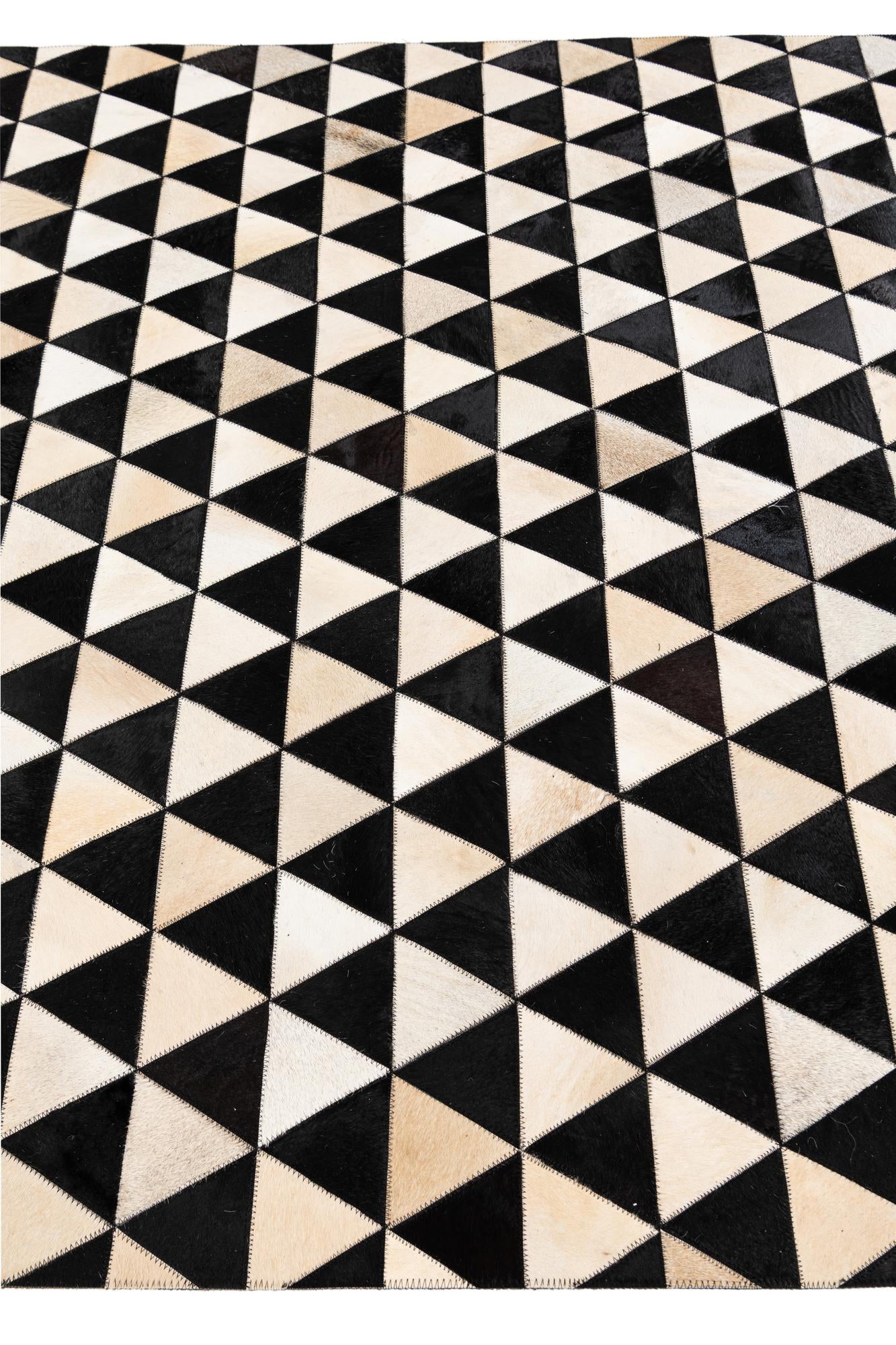 5' 1 x 8' 2 Cowhide Stocks Rug