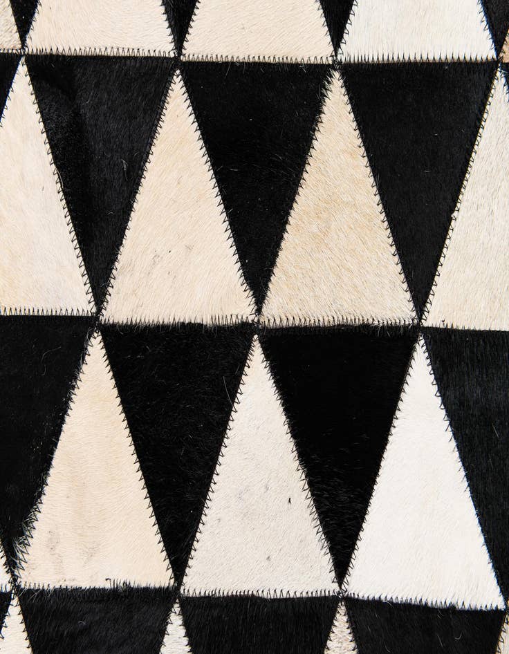 Detail image of 5' 1 x 8' 2 Cowhide Stocks Rug