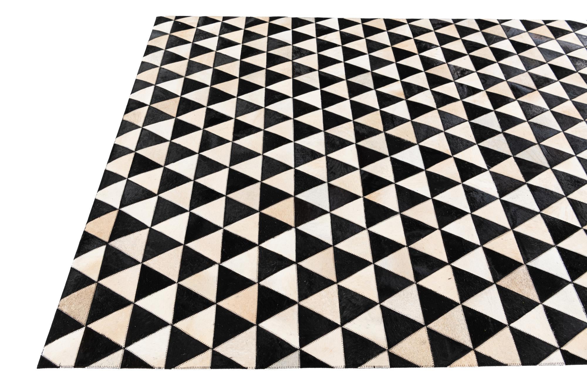 5' 1 x 8' 2 Cowhide Stocks Rug