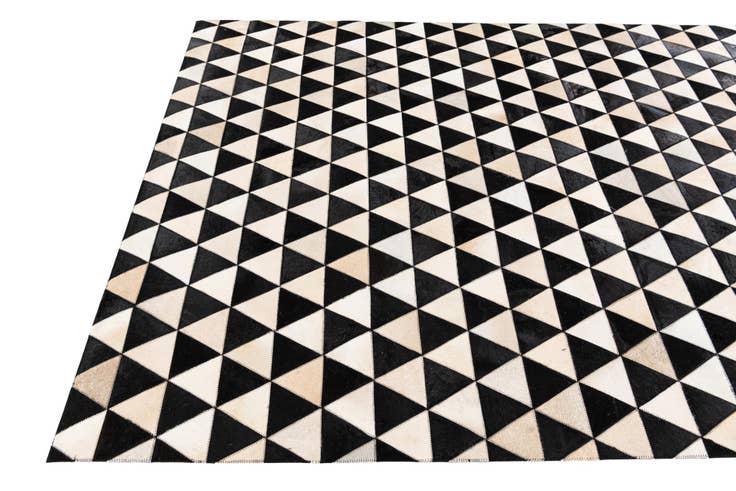 Detail image of 5' 1 x 8' 2 Cowhide Stocks Rug