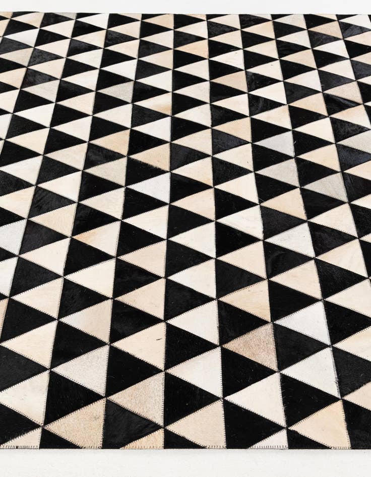 Detail image of 5' 1 x 8' 2 Cowhide Stocks Rug