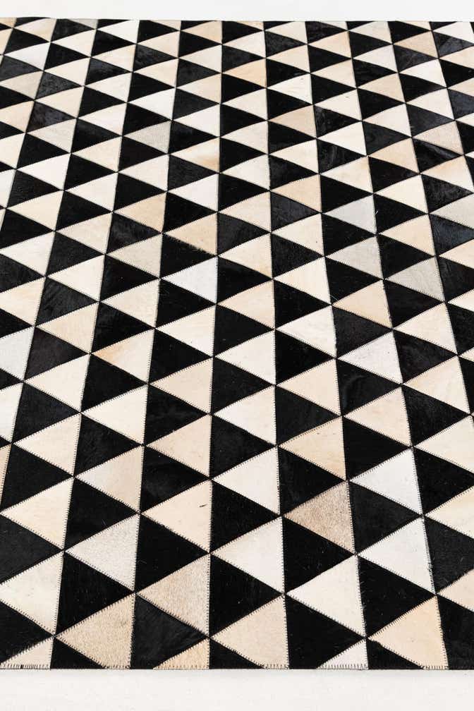 5' 1 x 8' 2 Cowhide Stocks Rug