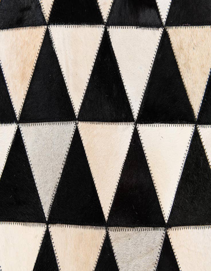 Detail image of 5' 1 x 8' 2 Cowhide Stocks Rug
