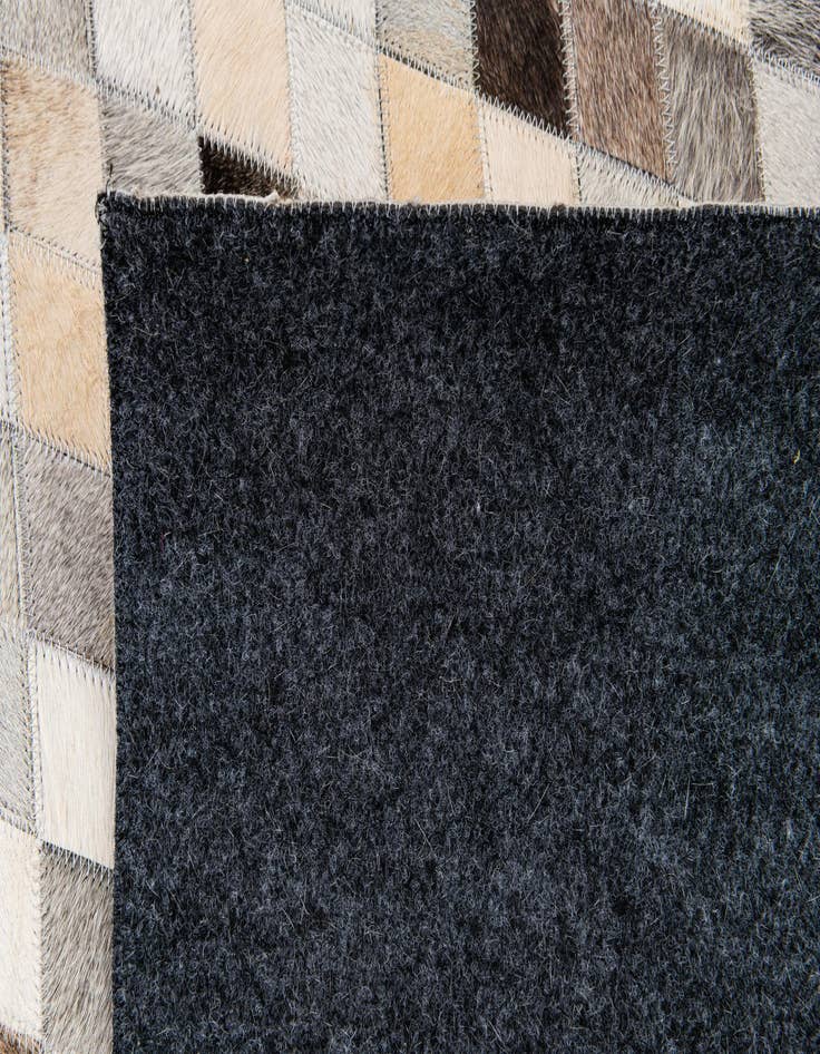 Detail image of 5' 8 x 7' 10 Cowhide Stocks Rug