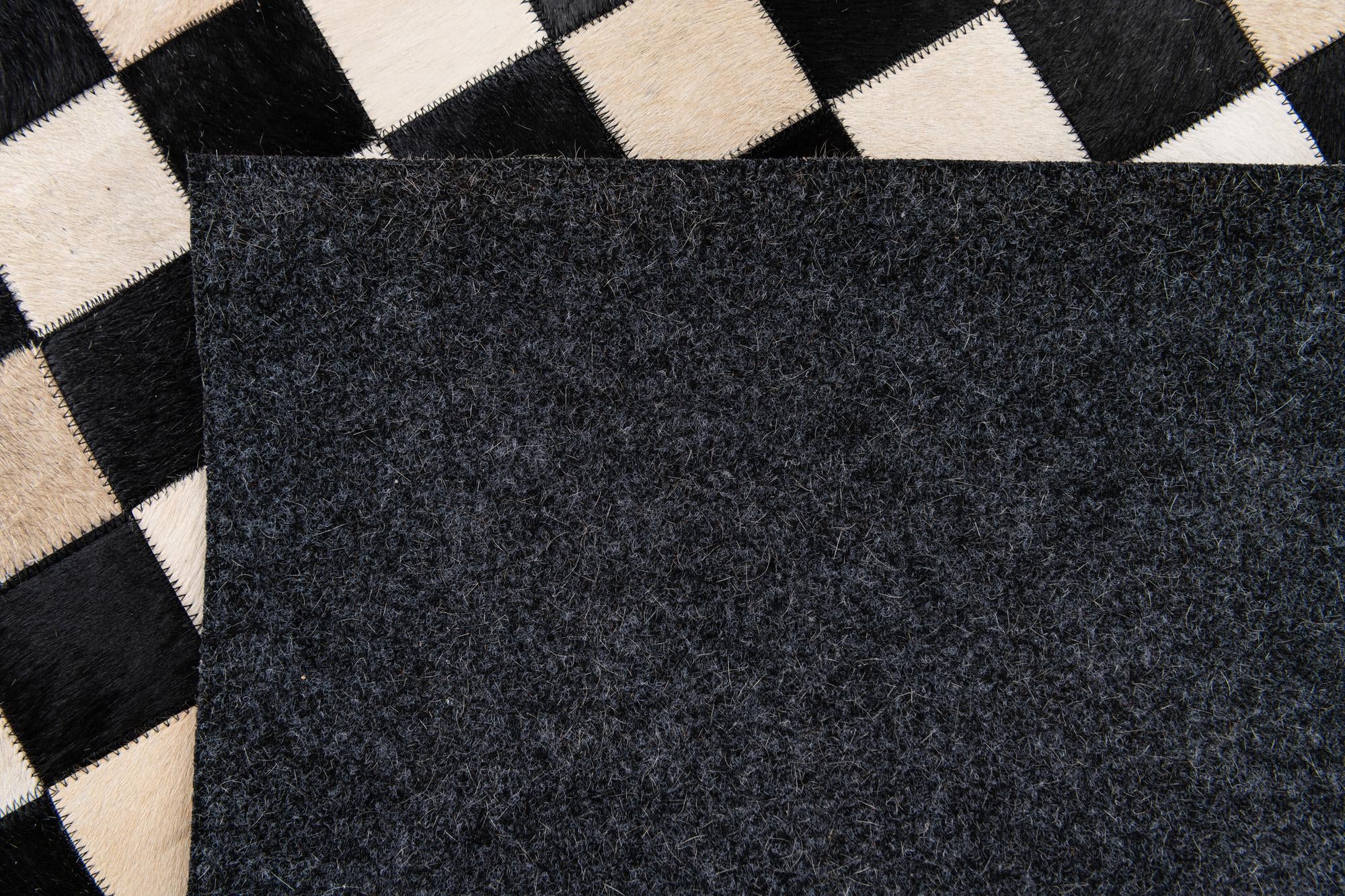 5' 8 x 7' 10 Cowhide Stocks Rug