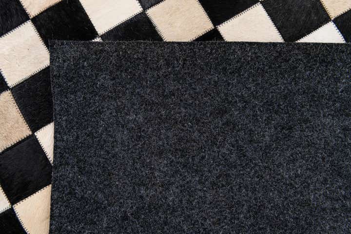 5' 8 x 7' 10 Cowhide Stocks Rug