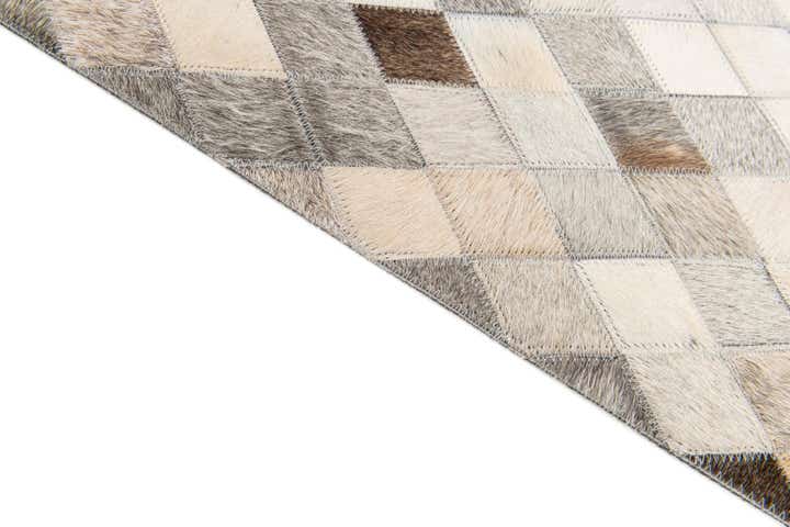 5' 7 x 7' 11 Cowhide Stocks Rug