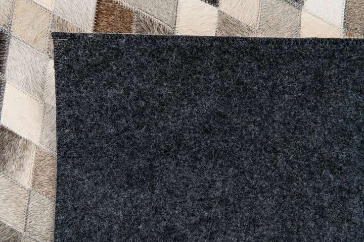 5' 7 x 7' 11 Cowhide Stocks Rug