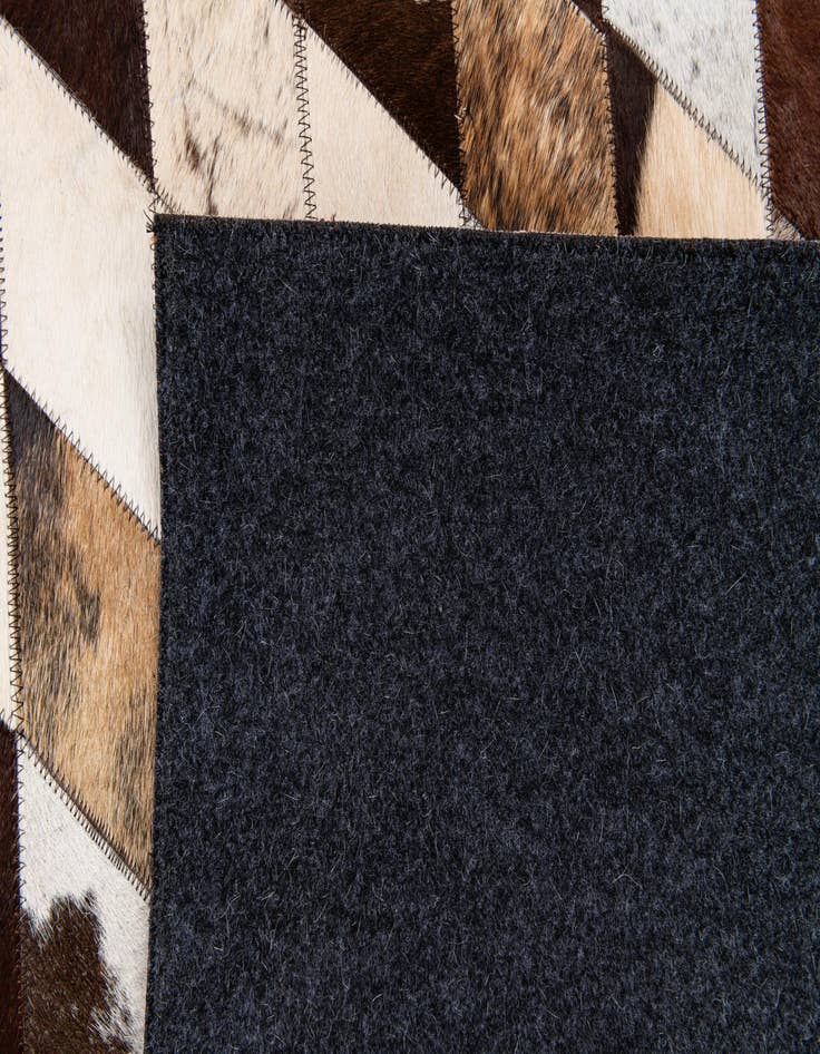 Detail image of 5' 8 x 7' 11 Cowhide Stocks Rug