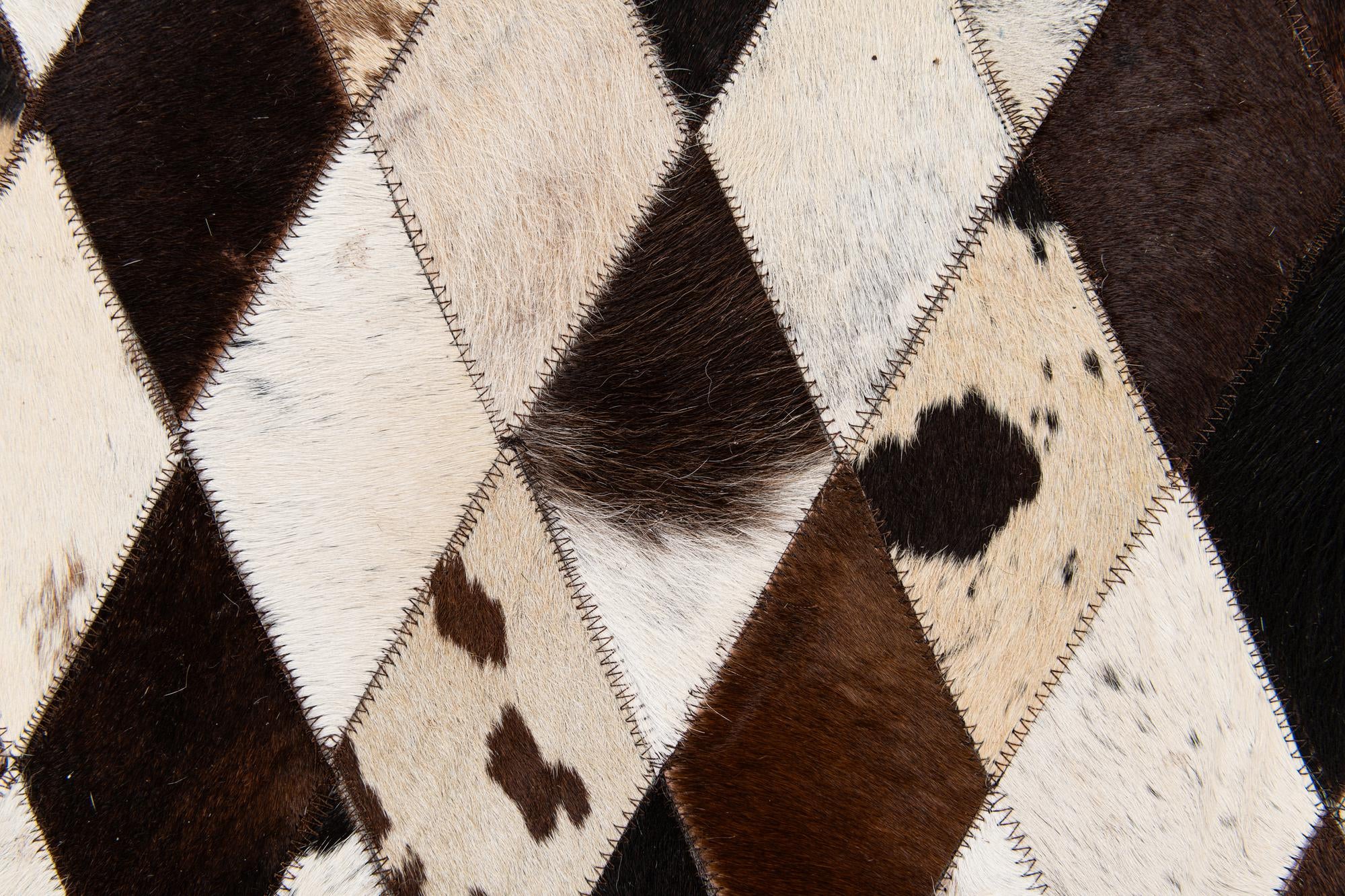 5' 7 x 8' Cowhide Stocks Rug