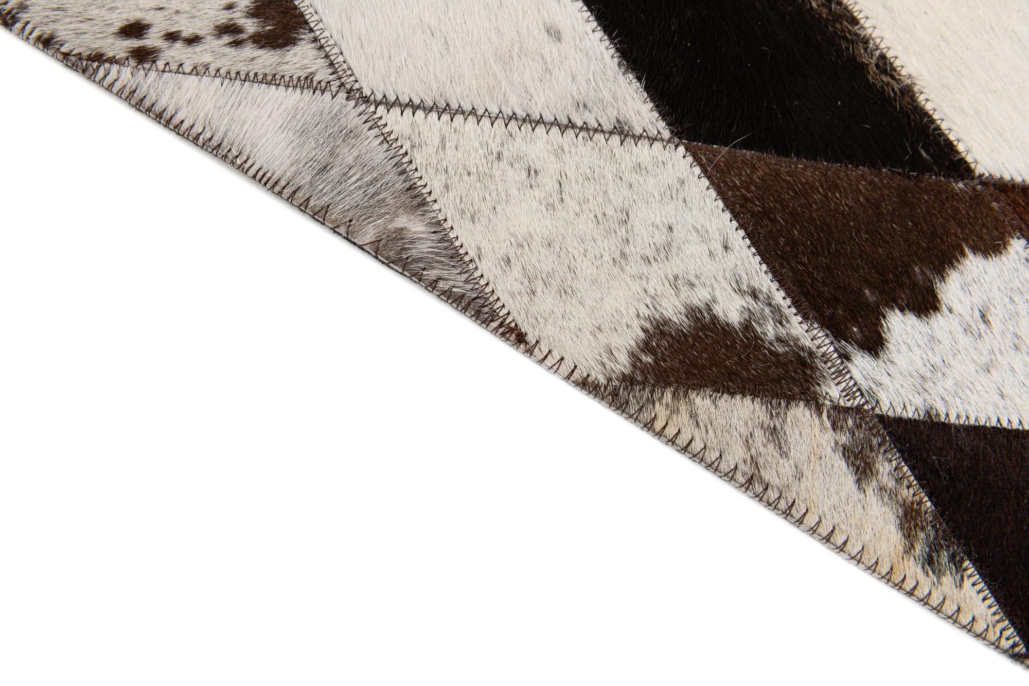 5' 8 x 7' 11 Cowhide Stocks Rug
