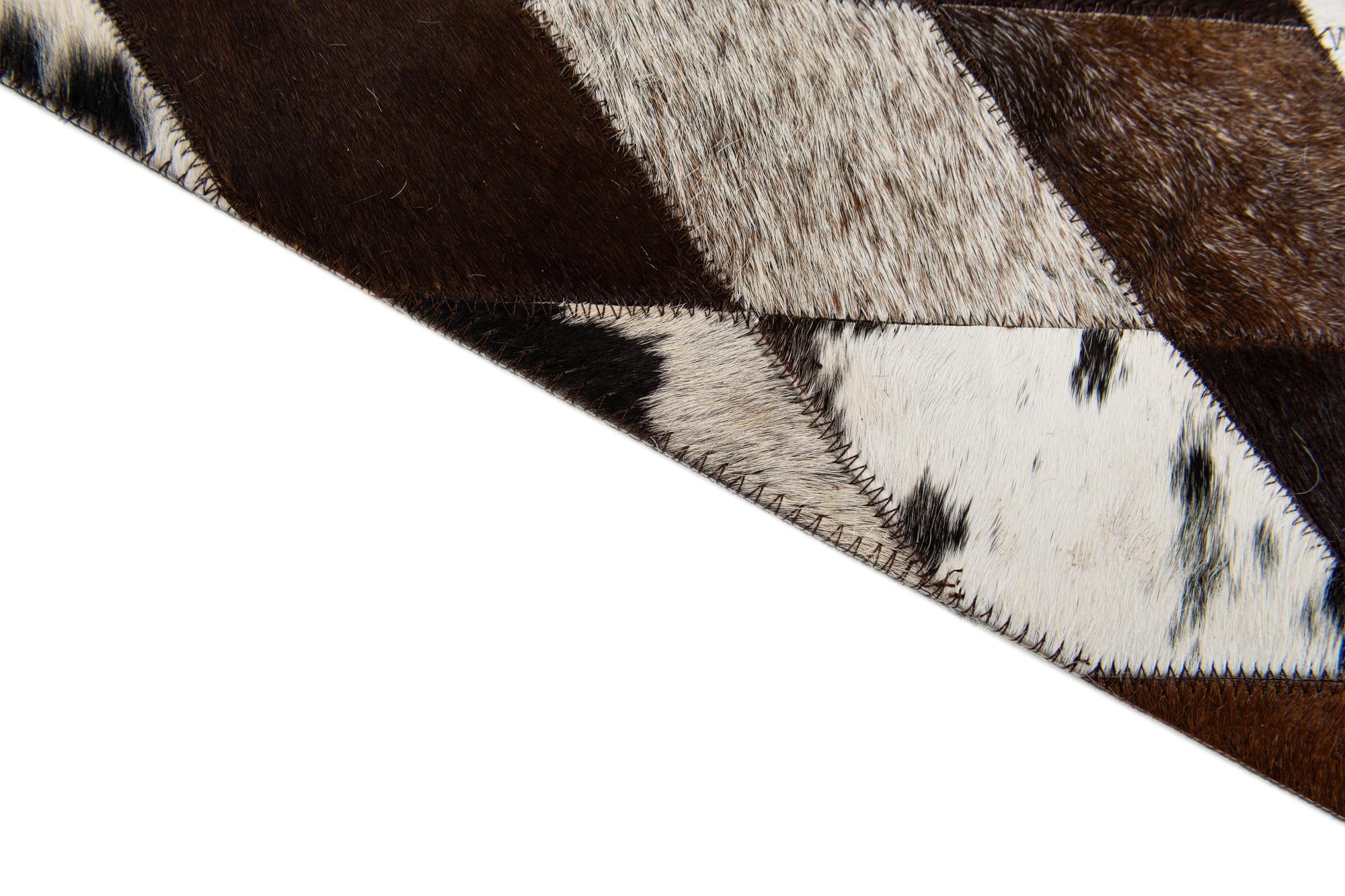 5' 8 x 7' 11 Cowhide Stocks Rug