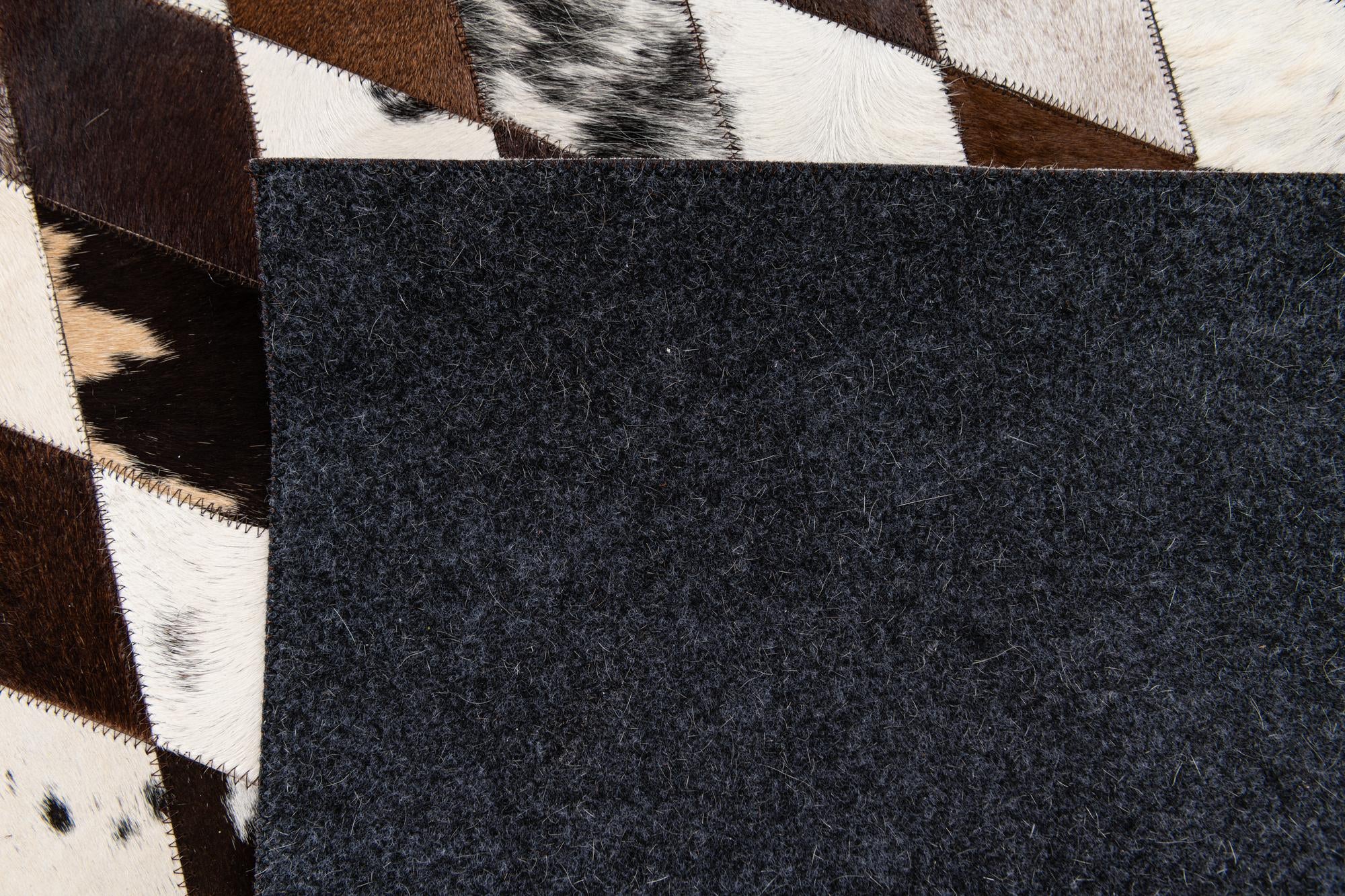 5' 8 x 7' 11 Cowhide Stocks Rug