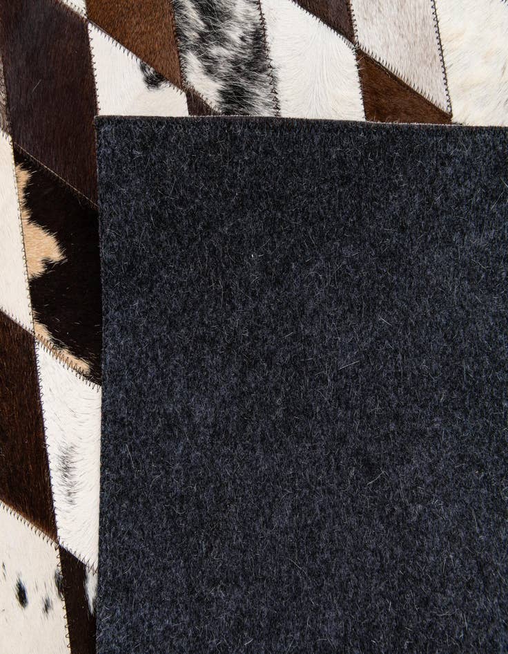 Detail image of 5' 8 x 7' 11 Cowhide Stocks Rug