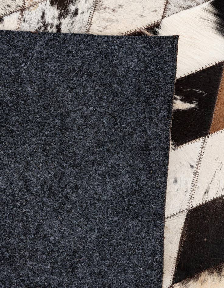 Detail image of 5' 7 x 8' Cowhide Stocks Rug